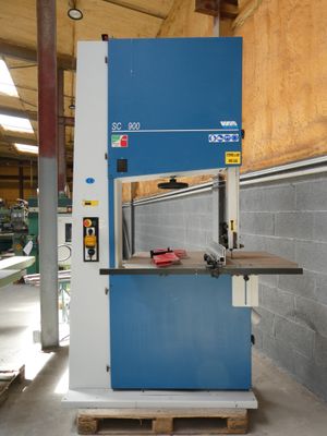 a machine that is sitting on a pallet in a building