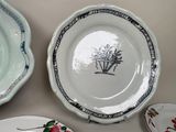 many plates that are sitting on a table