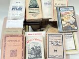 a lot of books that are sitting on a table