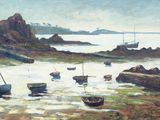 many boats that are sitting in the water by the shore