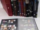several books are stacked on top of each other on a table