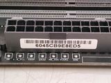 an image of a close up of a machine with a barcode on it