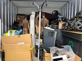 a lot of stuff in the back of a moving truck