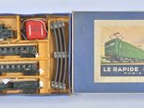 a box with a train set in it on a table