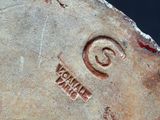 an image of a close up of a sculpture of a snail