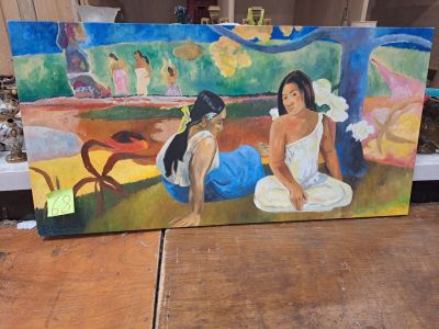 un tableau représentant deux femmes assises sur une table