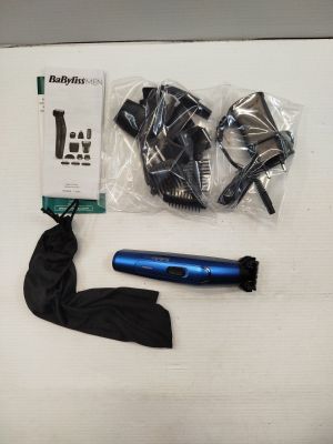 a hair dryer, blow dryer, and other items on a table
