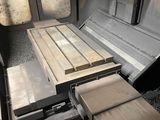 a picture of a machine that is working on a piece of wood
