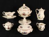 a lot of different types of china on display