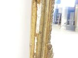 a mirror that is sitting on the wall in the room