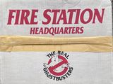 a sign that says fire station headquarterss on the side of a building