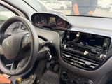 a dashboard of a car with a steering wheel and a dash board