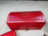 a red box that is sitting on the floor