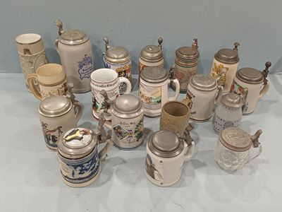 many different types of beer mugs on the table