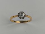 an engagement ring with a single diamond in the center
