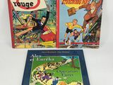 two children ' s books on a white surface