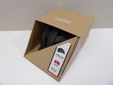 a box with a mouse inside of it on a table