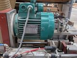 a machine that is sitting on a table in a warehouse