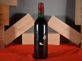 a bottle of wine that is sitting on a table