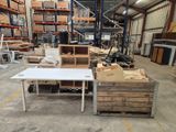 a large warehouse filled with lots of boxes and tables