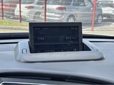 a car dashboard with a digital display on it