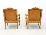 pair of antique chairs with upholstered back and arms