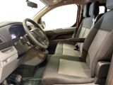 the interior of a car with a steering wheel and a dashboard