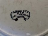 a white plate with a black and white label on it