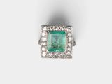 an emerald and diamond ring