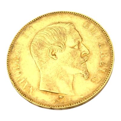 l'image d'une pièce d'or sur laquelle figure le visage d'un homme