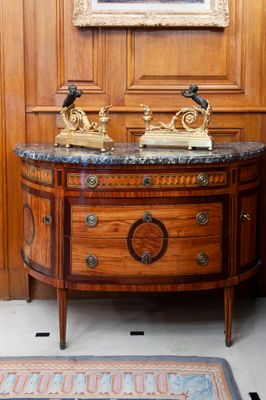 a picture of a wooden cabinet with a marble top