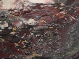a close up of a table with a marble top on it