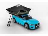 a blue car with a tent on top of it