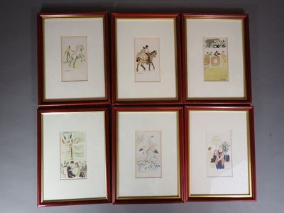 four framed pictures of people and a dog in a room