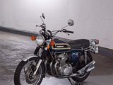a motorcycle that is parked inside of a building