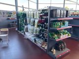 a store with a lot of food and drinks on the shelves
