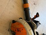 a picture of a blower and other tools on the floor