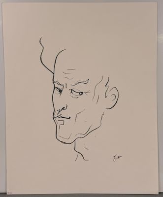 an ink drawing of a man ' s face on a piece of paper