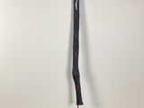 a close up of a hockey stick on a stand in a room