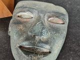 an image of a stone mask on the floor