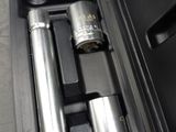 a tool in the case that is open and ready to be used