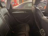 a view of the inside of a car from the passenger seat