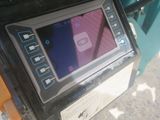 an image of a machine that is on the side of the road