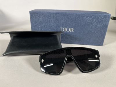 a close up of a pair of sunglasses on a table