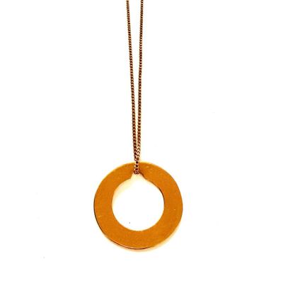 gold plated necklace with a circular pendant hanging from a chain