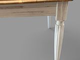 a wooden table with a drawer underneath it on a gray surface