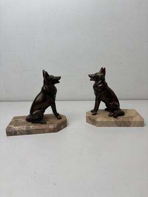 pair of antique bronze dog figurines on marble bases