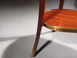 a close up of a table with a shelf on top of it