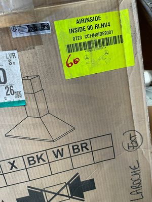 a cardboard box with a label on it sitting on top of a table