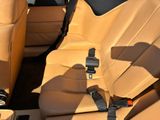a seat belt that is attached to the back of a car